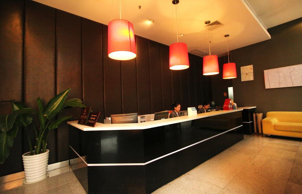 Yi-Wu Commatel Hotel Гуанчжоу Экстерьер фото