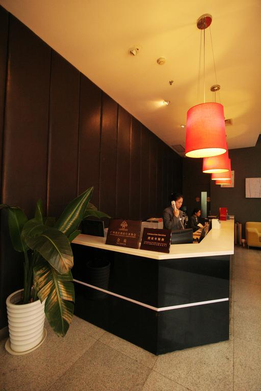Yi-Wu Commatel Hotel Гуанчжоу Экстерьер фото