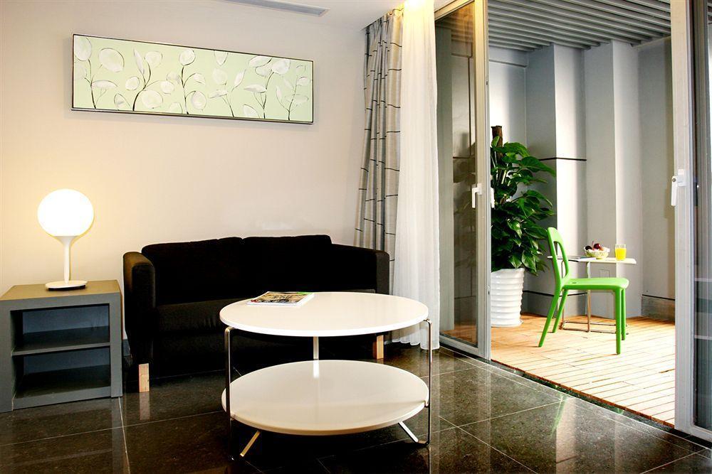 Yi-Wu Commatel Hotel Гуанчжоу Экстерьер фото