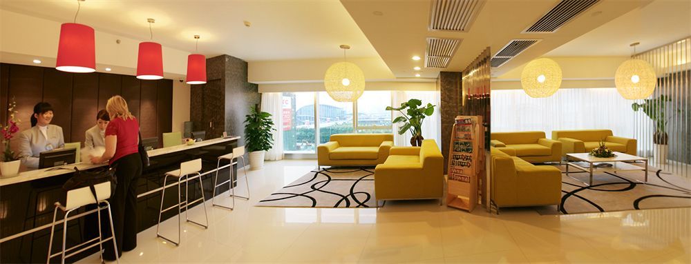 Yi-Wu Commatel Hotel Гуанчжоу Экстерьер фото