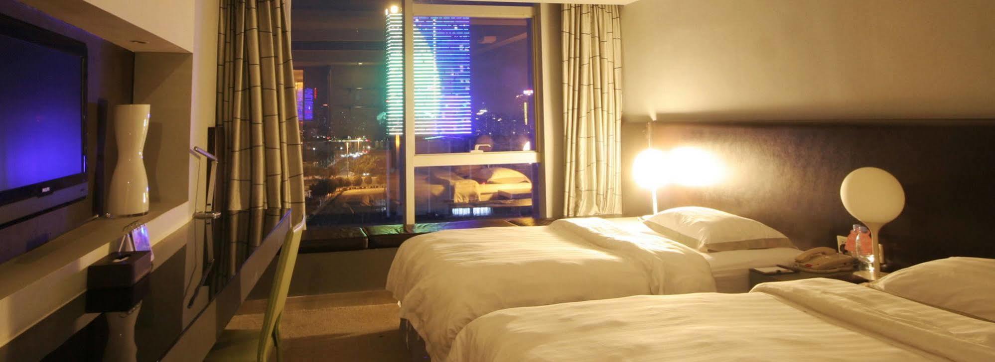 Yi-Wu Commatel Hotel Гуанчжоу Экстерьер фото