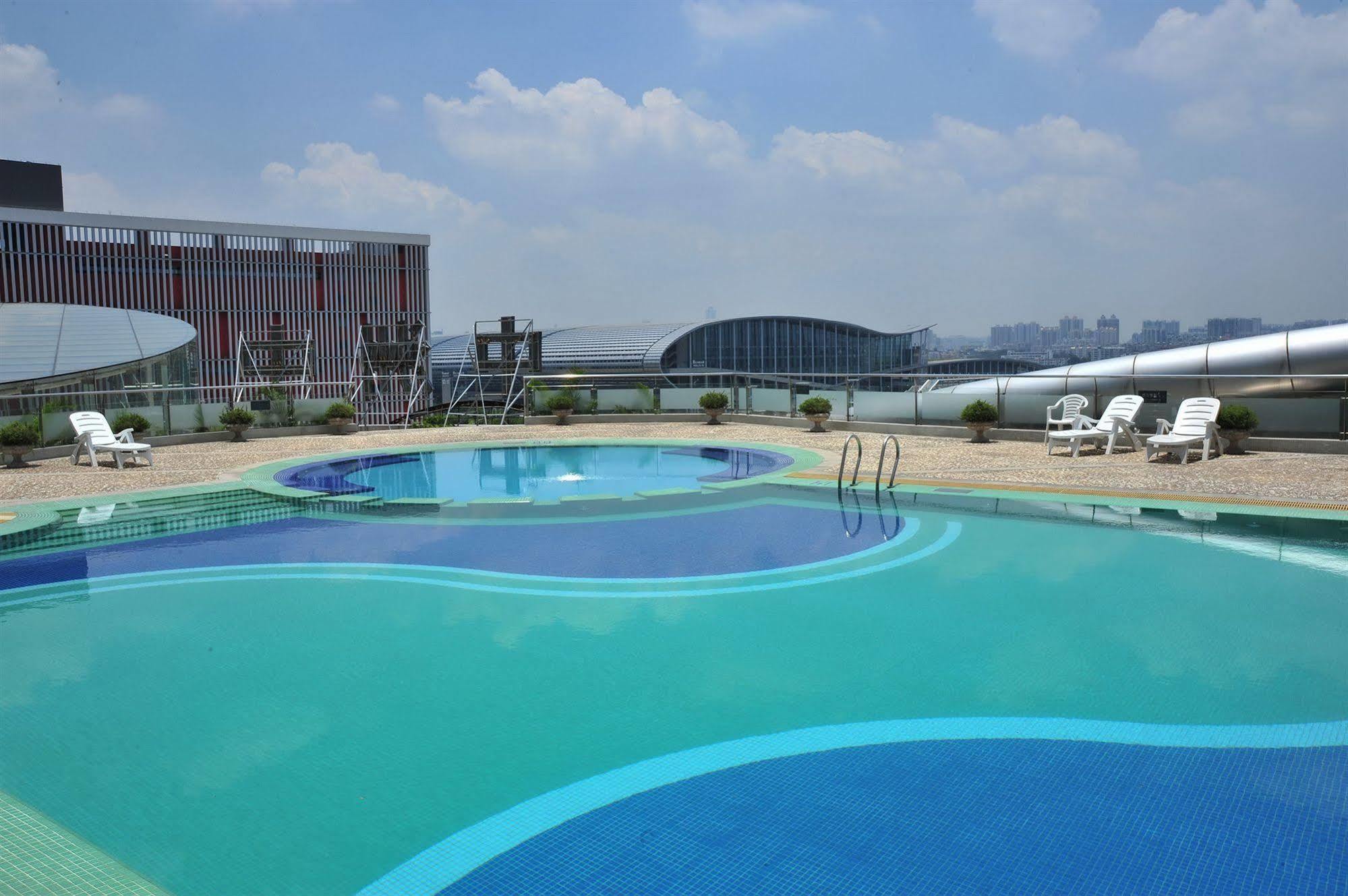 Yi-Wu Commatel Hotel Гуанчжоу Экстерьер фото