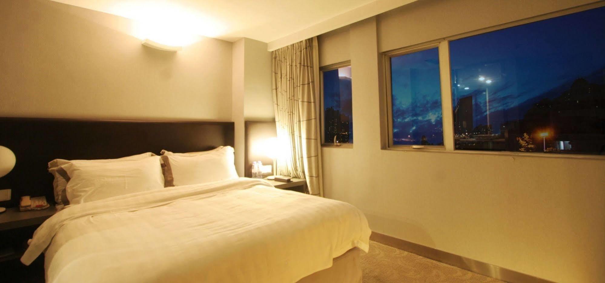 Yi-Wu Commatel Hotel Гуанчжоу Экстерьер фото