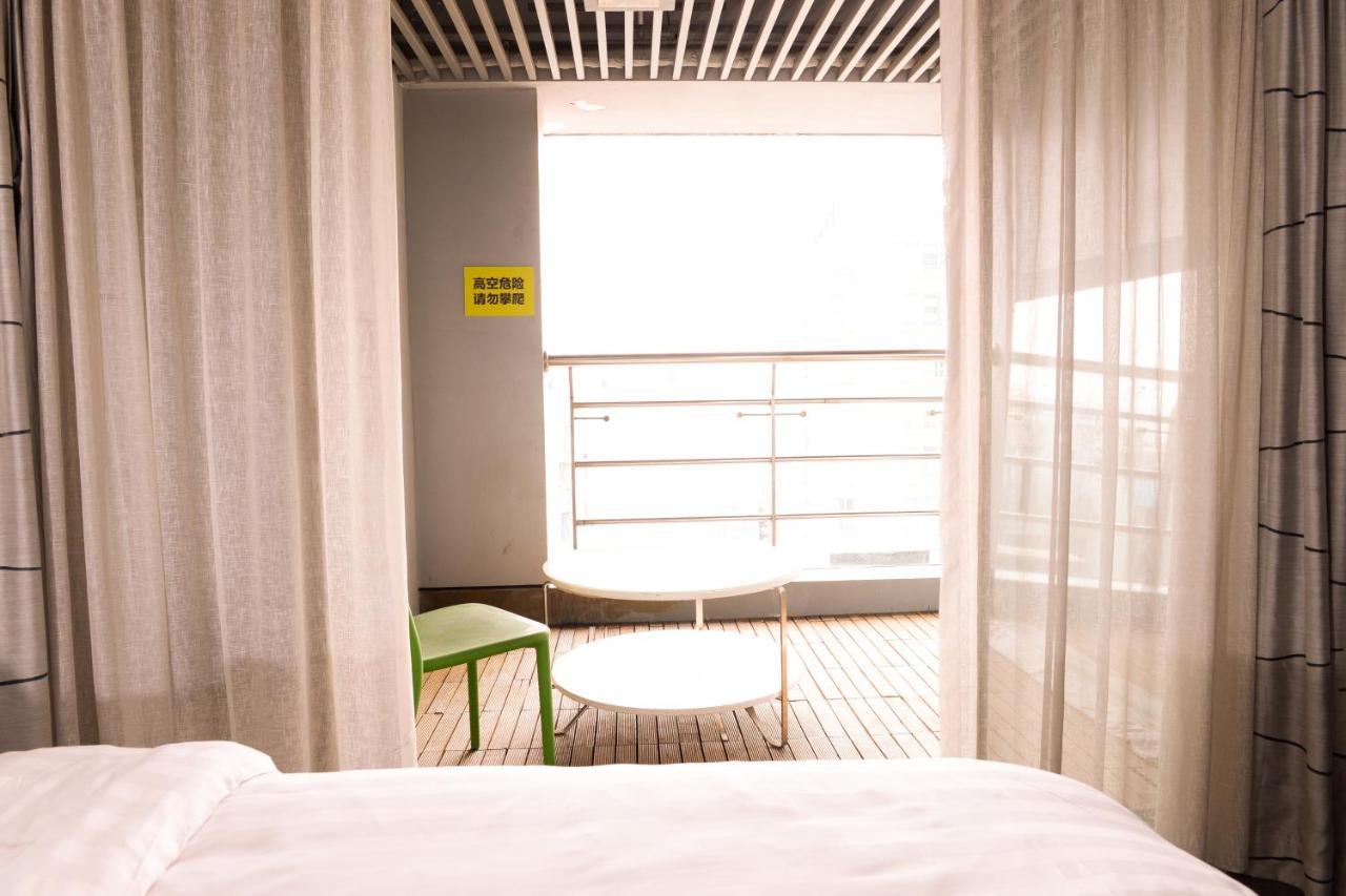 Yi-Wu Commatel Hotel Гуанчжоу Экстерьер фото