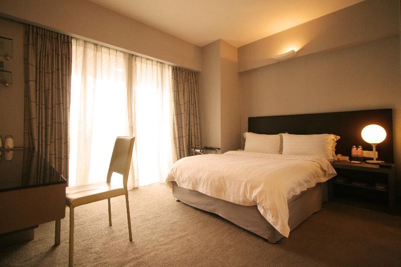 Yi-Wu Commatel Hotel Гуанчжоу Экстерьер фото